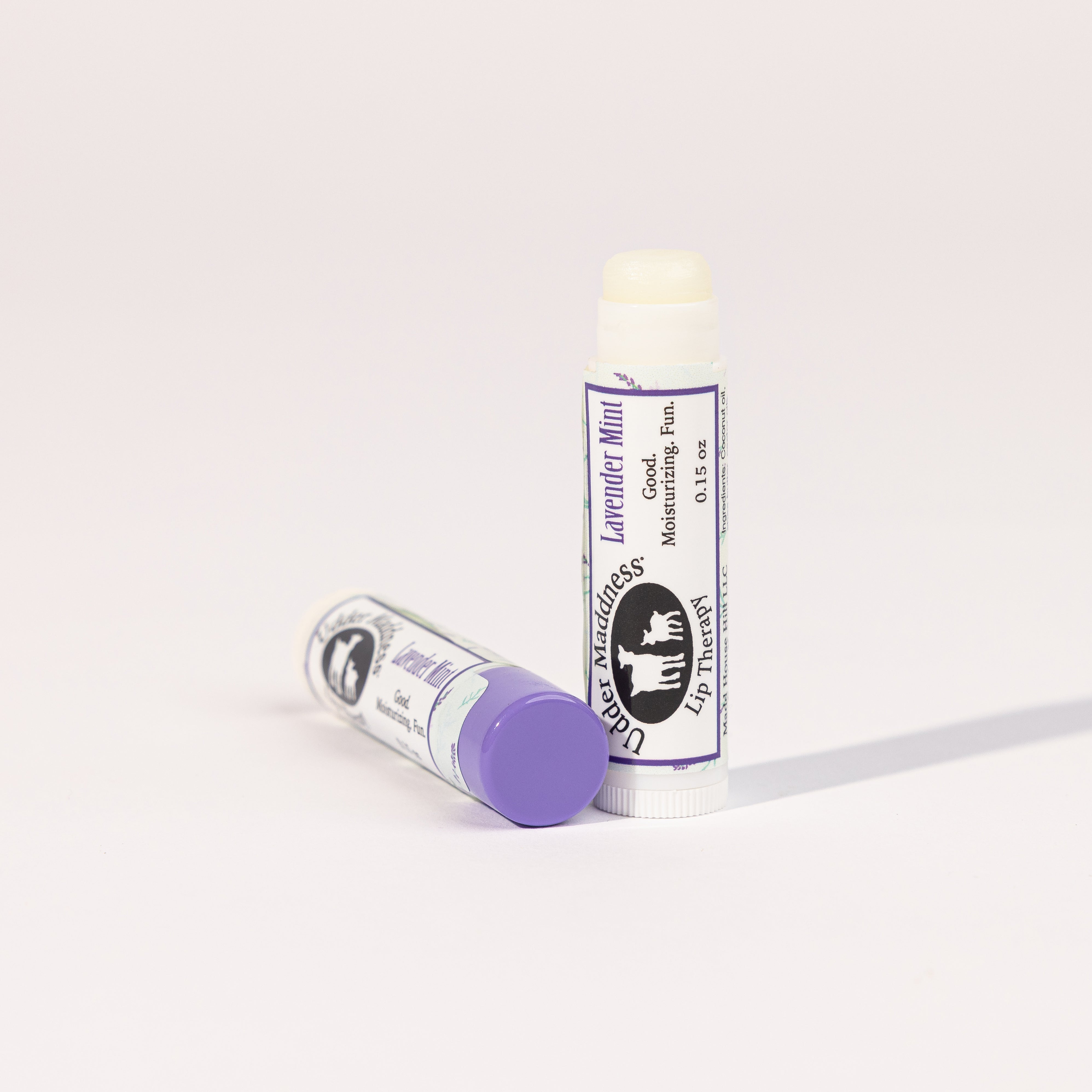 Madd House Hill Udder Maddness Lavender Mint Lip Therapy — open lip balm showing moisturizing product, all-natural ingredients, 0.15 oz