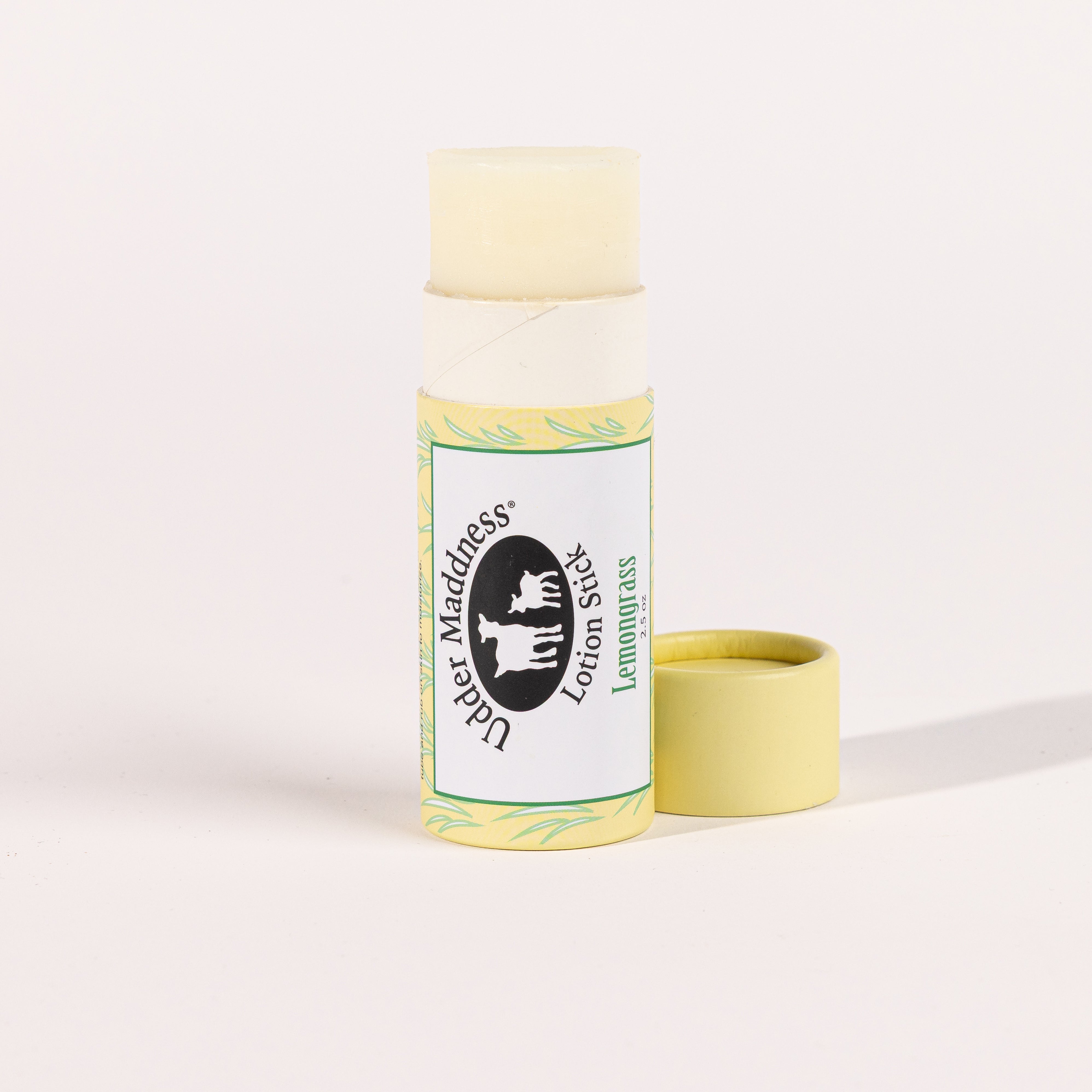 Madd House Hill Udder Maddness Lemongrass Goat Milk Lotion Stick — open stick showing creamy goat milk lotion, all-natural moisturizer, 2.65 oz