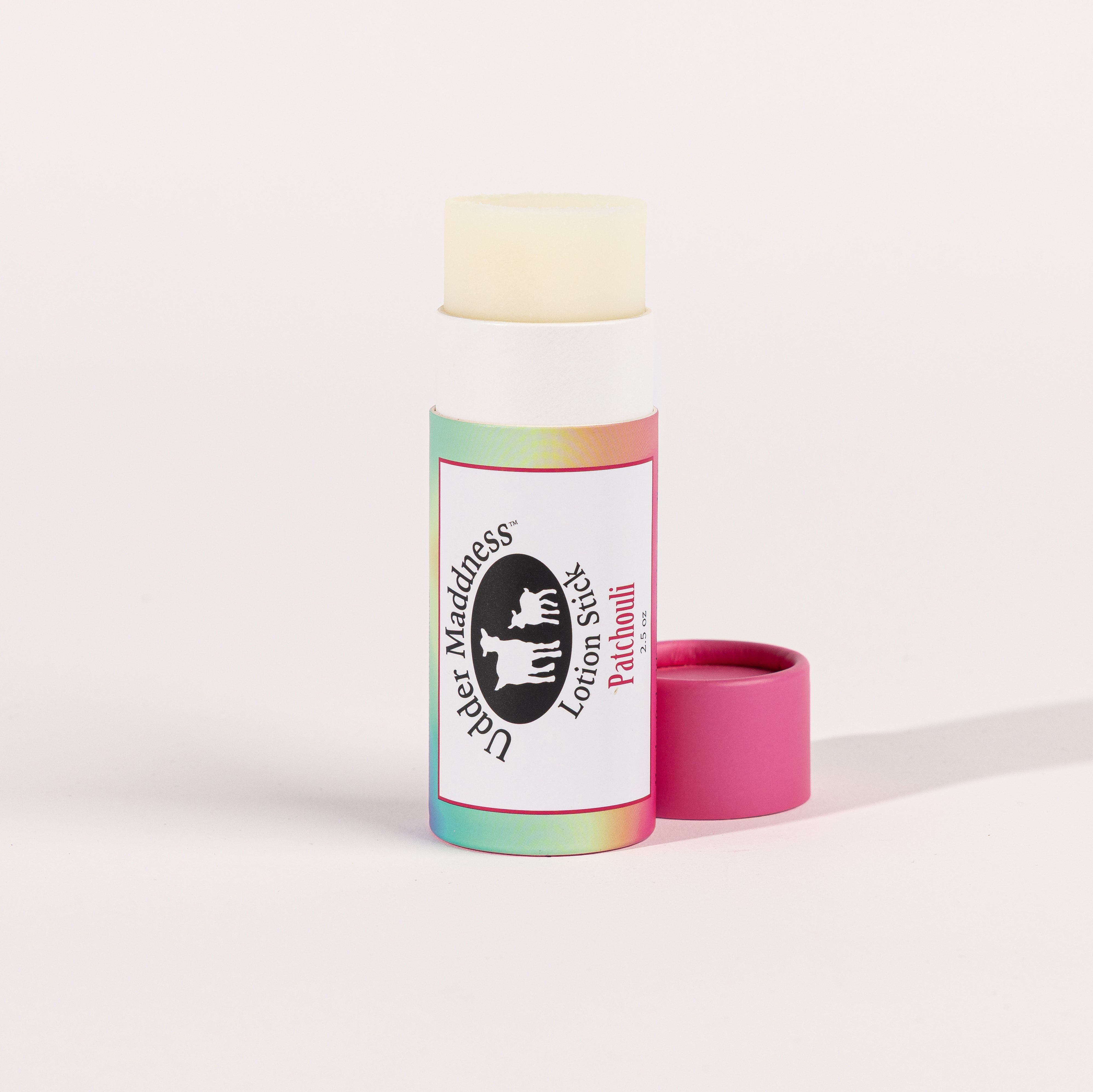 Madd House Hill Udder Maddness Patchouli Goat Milk Lotion Stick — open stick showing creamy goat milk lotion, all-natural moisturizer, 2.65 oz
