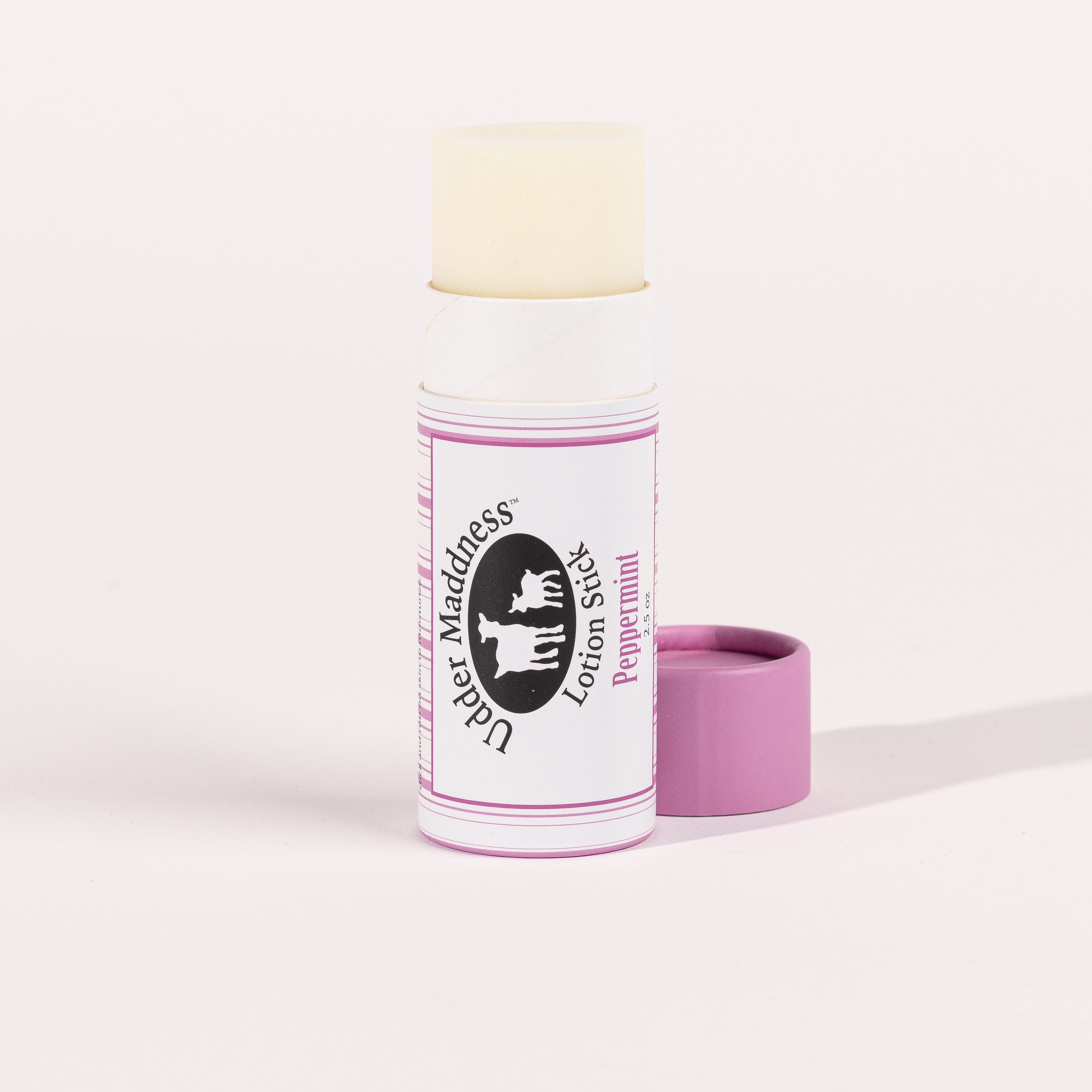 Madd House Hill Udder Maddness Peppermint Goat Milk Lotion Stick — open stick showing creamy goat milk lotion, all-natural moisturizer, 2.65 oz