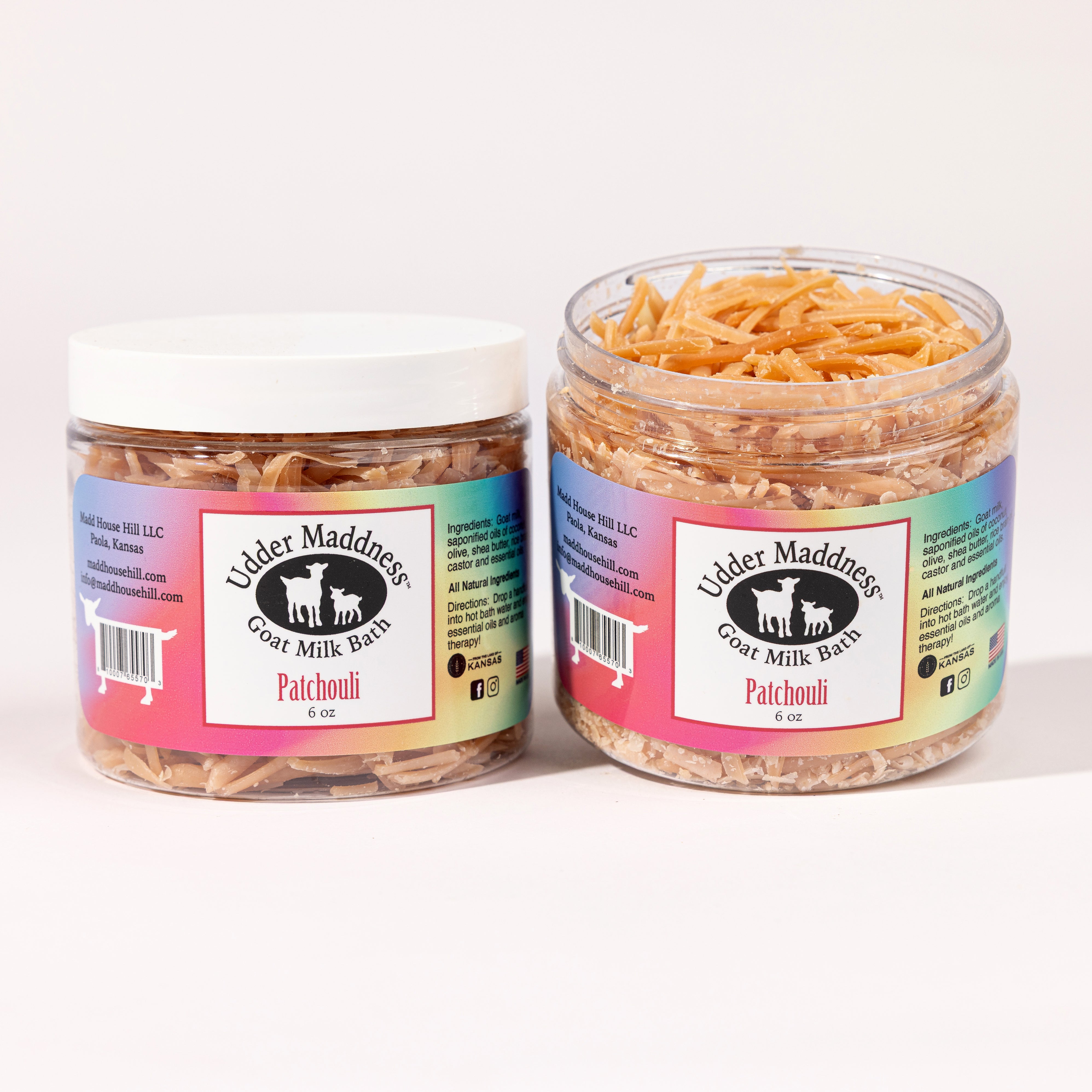 Madd House Hill Udder Maddness Patchouli Goat Milk Bath Soak — two open jars showing milk flake texture, all-natural moisturizing bath soak