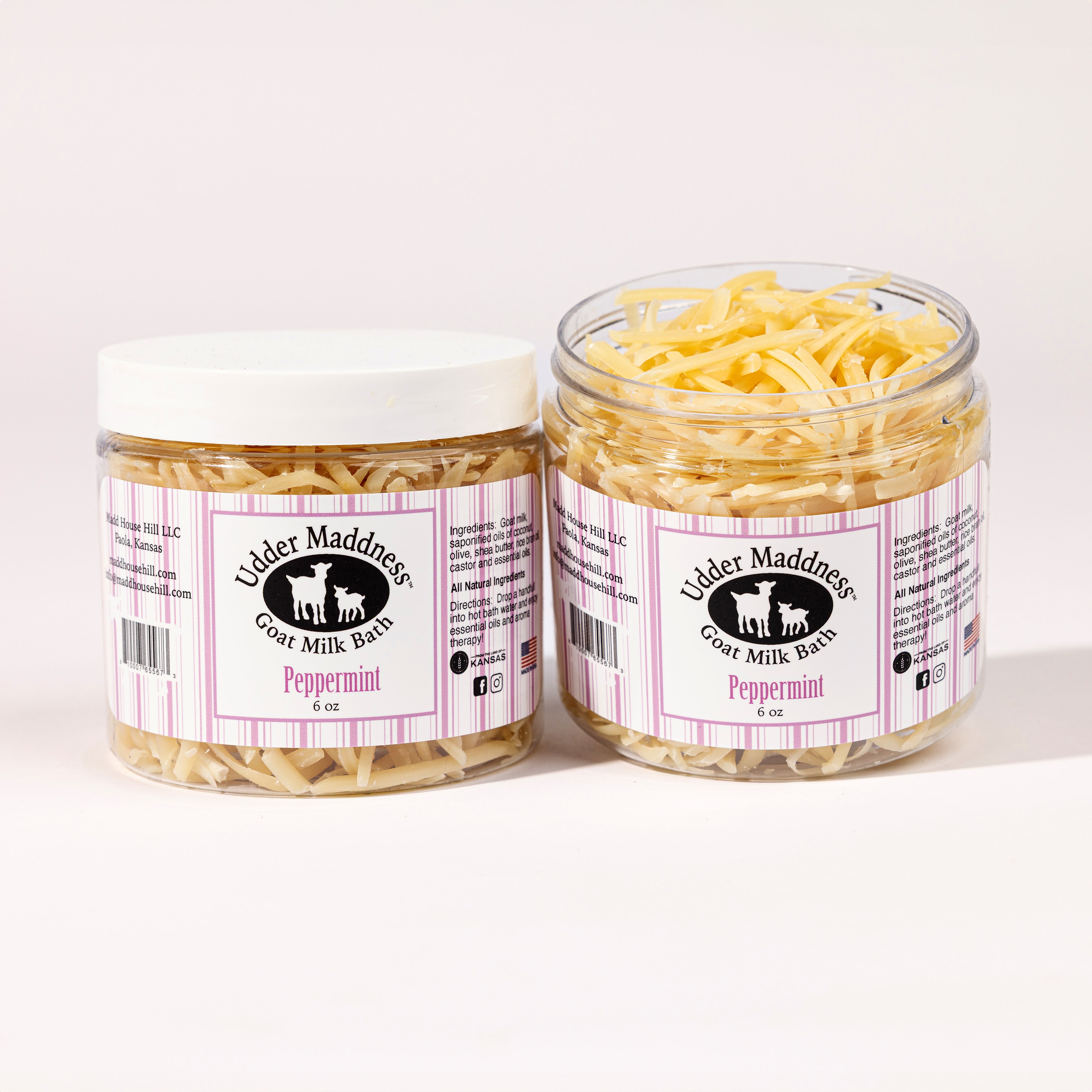 Madd House Hill Udder Maddness Peppermint Goat Milk Bath Soak — two open jars showing milk flake texture, all-natural moisturizing bath soak