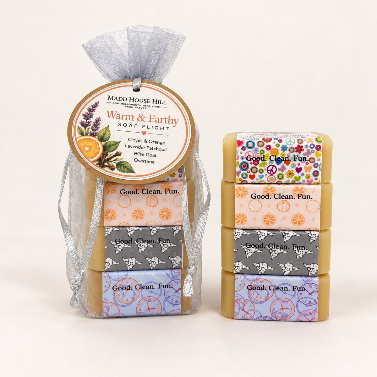 Warm and Earthy Soap Flight gift bag with four mini goat milk soap bars